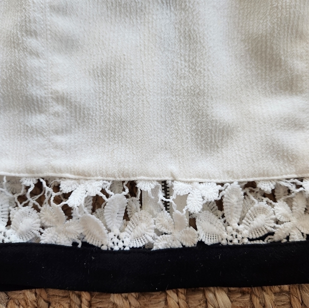 White Sleveless Black and Floral Detail on Bottom. SIZE Small - Picture 2 of 4